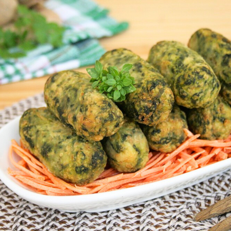 Crocchette di patate e spinaci, dorate e delicate, ideali per un piatto vegano semplice ma gustoso.